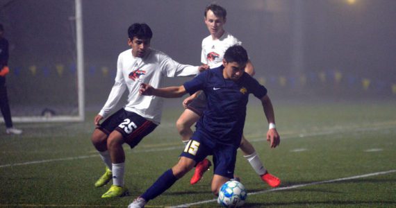 RYAN SPARKS | THE DAILY WORLD Aberdeen junior Carlos Mendoza (15) maneuvers against Centralia defender Cesar Ruiz Nino (25) during the Bobcats’ 4-0 win on Tuesday at Stewart Field in Aberdeen.