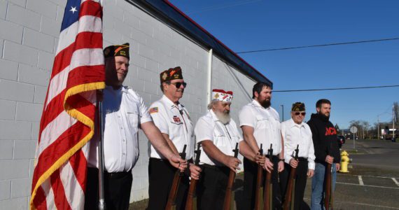 Elma VFW Bill Mann Post 1948 members (from left to right) Jim Mears, Tyler Marriott, Bill Wickwire, Cody Fries, Chuck McLane and Brad Dendy line up with an American flag and the seven ceremonial M1 Garand rifles that, once stolen, have since been recovered. The members couldn’t be more relieved. Matthew N. Wells | The Daily World