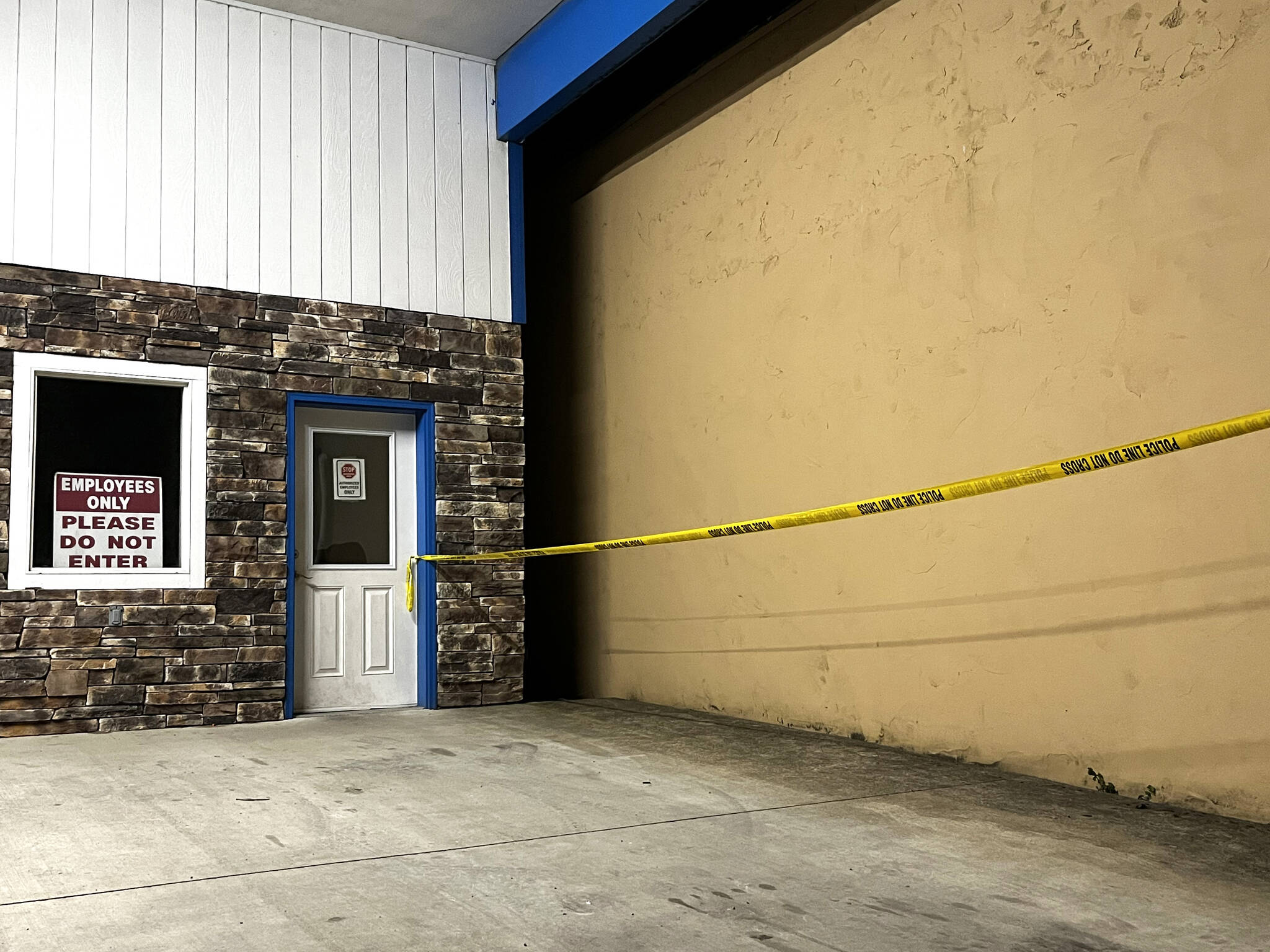 Allen Leister | The Daily World
                                The alleyway between Price & Price Real Estate and Whitney’s Auto Detail is closed off the public due to the investigation. The male body was found in a basement under the Price & Price Real Estate building on 120 W. Pioneer Ave., in Montesano.