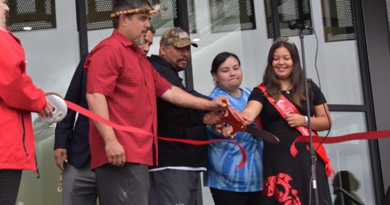 (Matthew N. Wells | The Daily World)
                                Quinault Indian Nation President Guy Capoeman (left) cuts the Quinault Wellness Center ceremonial ribbon with other members of the Quinault tribe on Aug. 31, in Aberdeen. The treatment center is excepted to have its grand opening on Oct. 3.