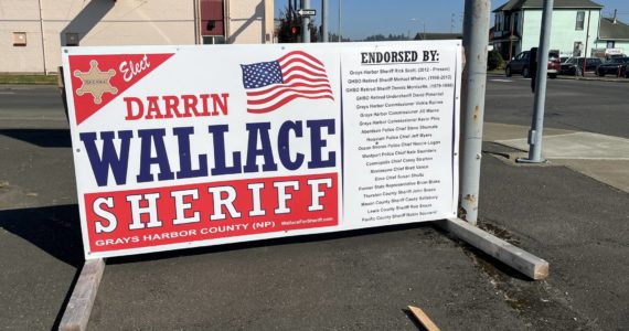 (Matthew N. Wells | The Daily World)
                                Michael Catlett alleges in his Election Interference letter that the endorsement sign for Darrin Wallace on the corner of Heron and Alder Street in Aberdeen contributed to his belief that there is a “concerted effort to prevent him from being elected” as the next Grays Harbor County Sheriff