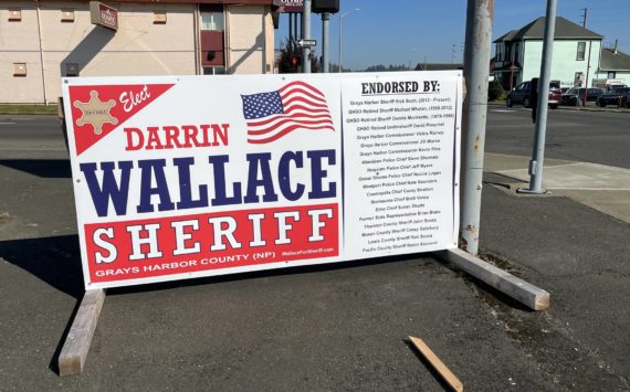 (Matthew N. Wells | The Daily World)
                                Michael Catlett alleges in his Election Interference letter that the endorsement sign for Darrin Wallace on the corner of Heron and Alder Street in Aberdeen contributed to his belief that there is a “concerted effort to prevent him from being elected” as the next Grays Harbor County Sheriff